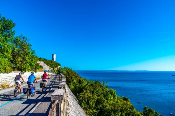 people bike sea italy